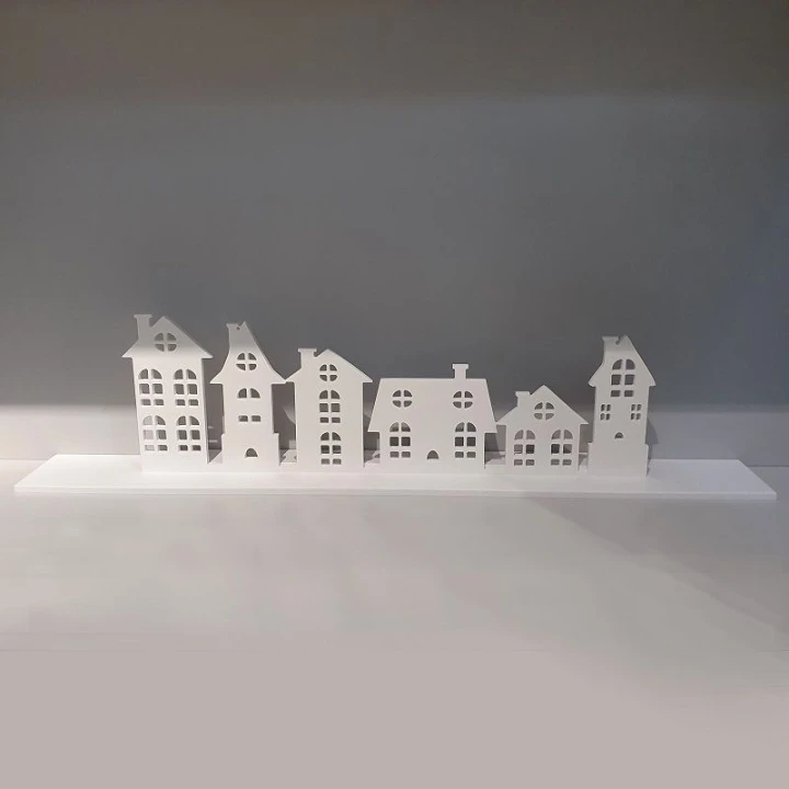 bialy-swiecznik-swiateczny-z-domkami-solid-surface.jpg