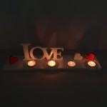 Świecznik z napisem Love i miejscem na cztery tealighty (solid surface)